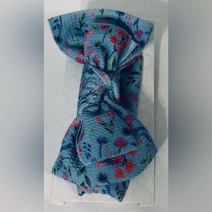 Girl’s head wrap with giant bow blue floral. Age 3up